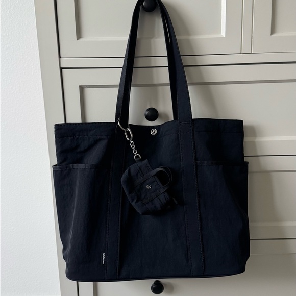 lululemon daily multi pocket tote bag toss in your sunnies Lululemon Daily Multi Pocket Tote